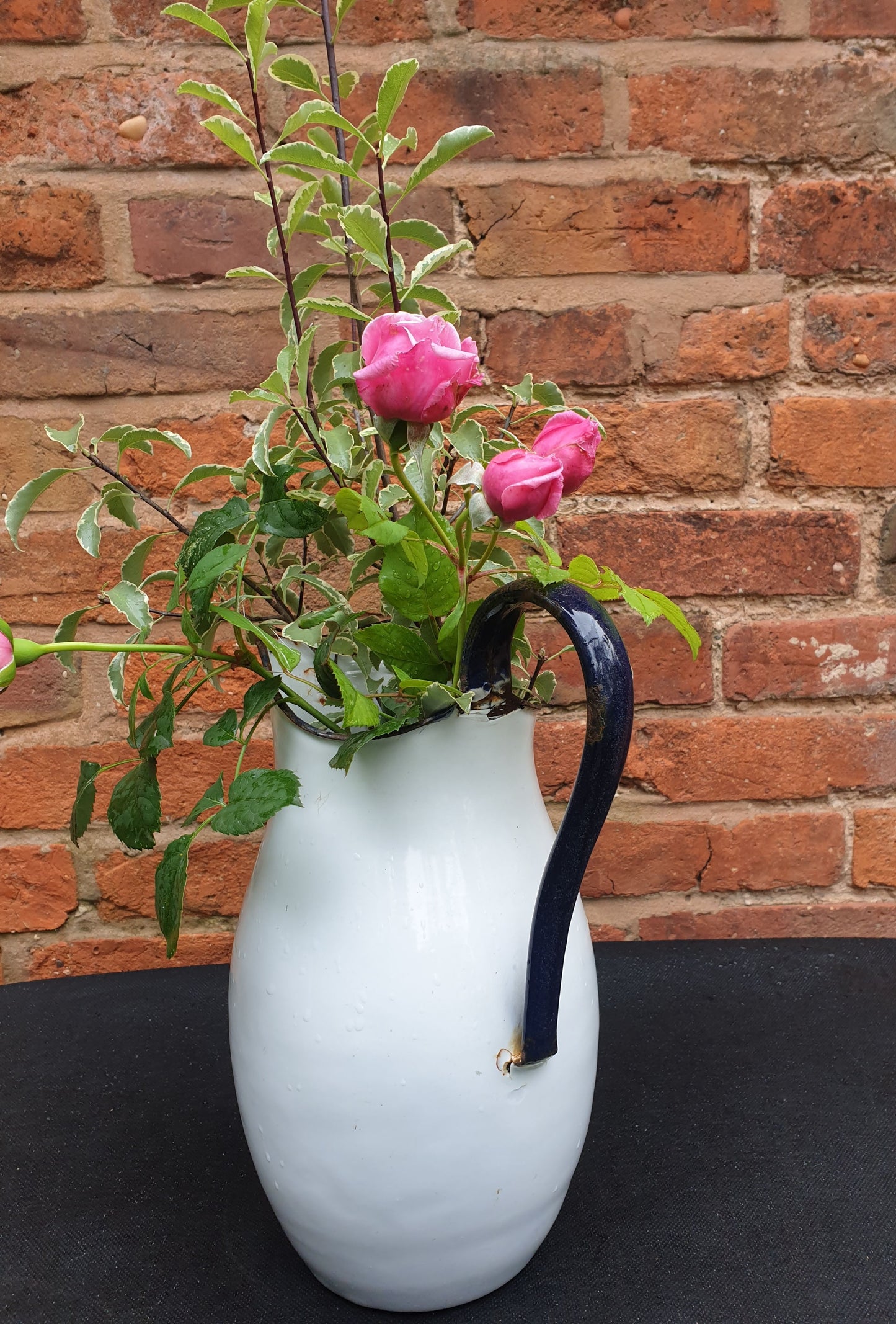 Enamel jug, large rounded.