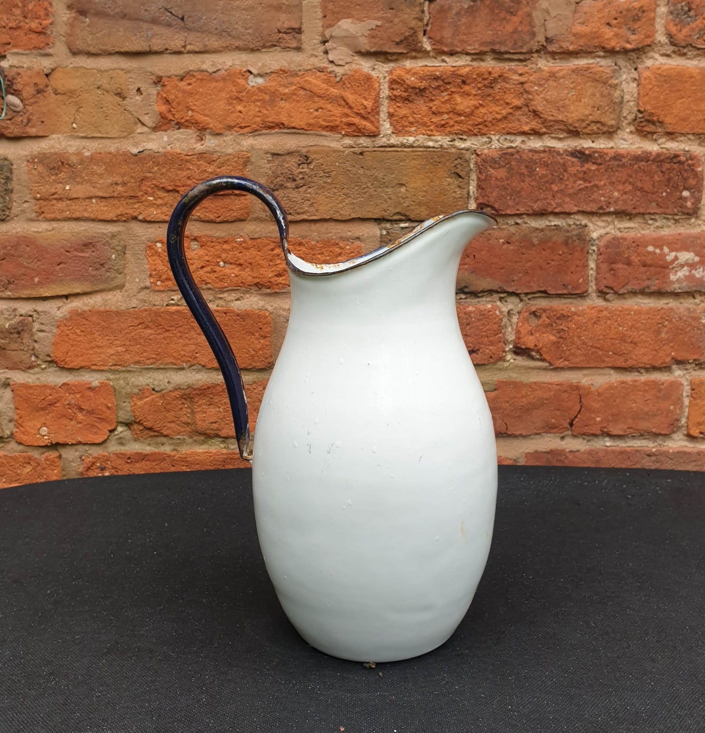 Enamel jug, large rounded.
