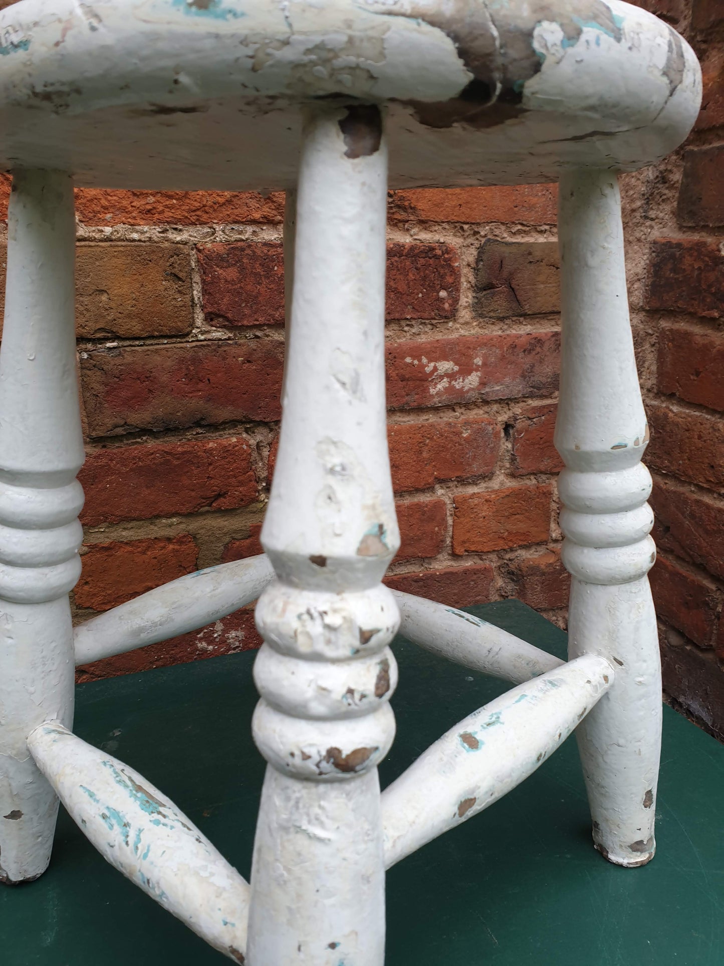 Small round white wooden stool