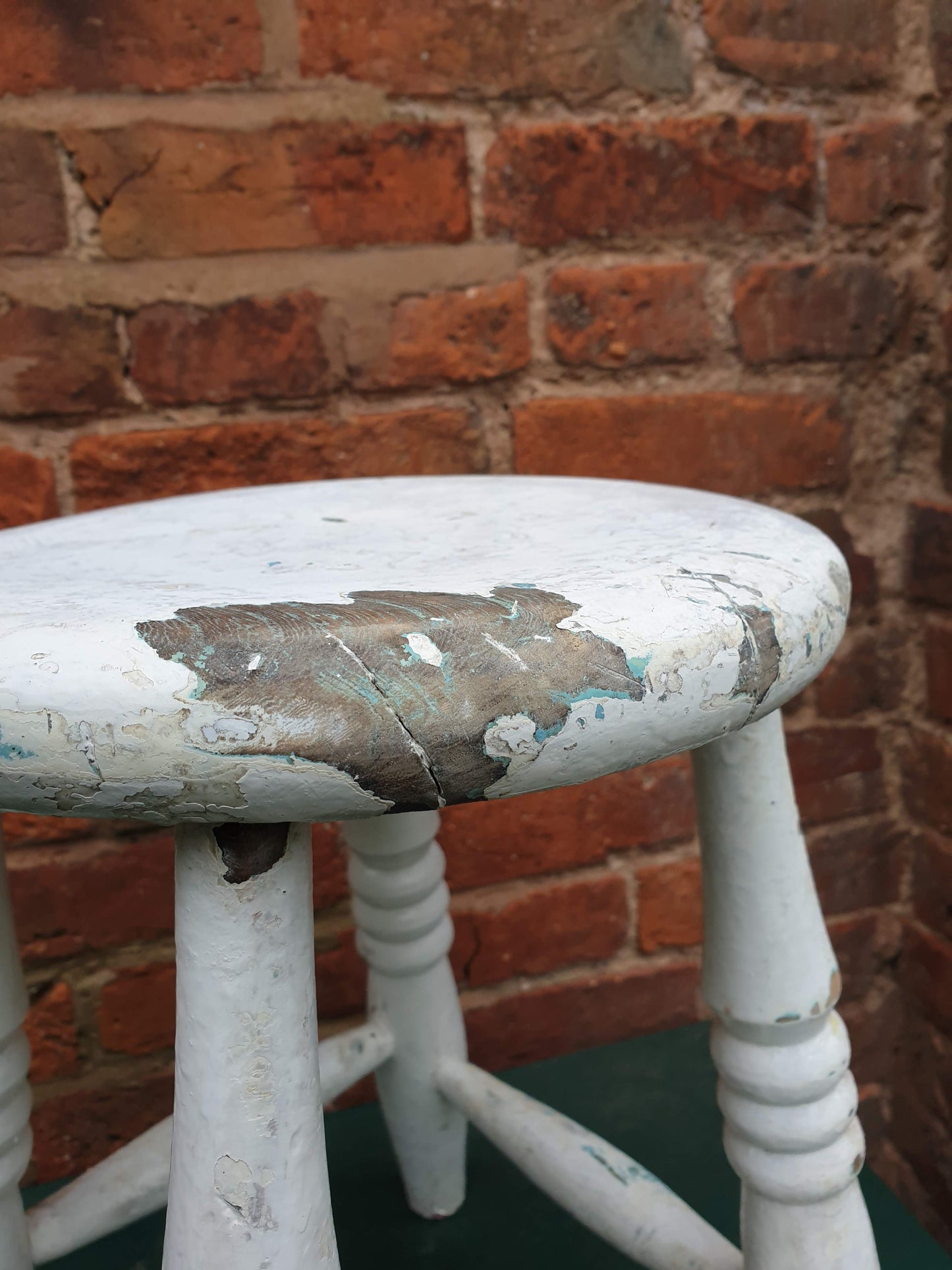 Small round white wooden stool