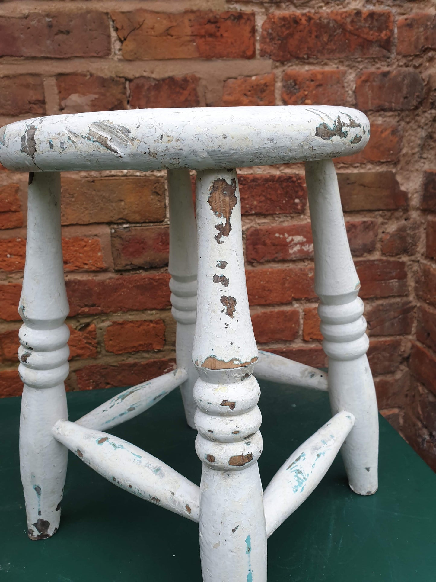 Small round white wooden stool