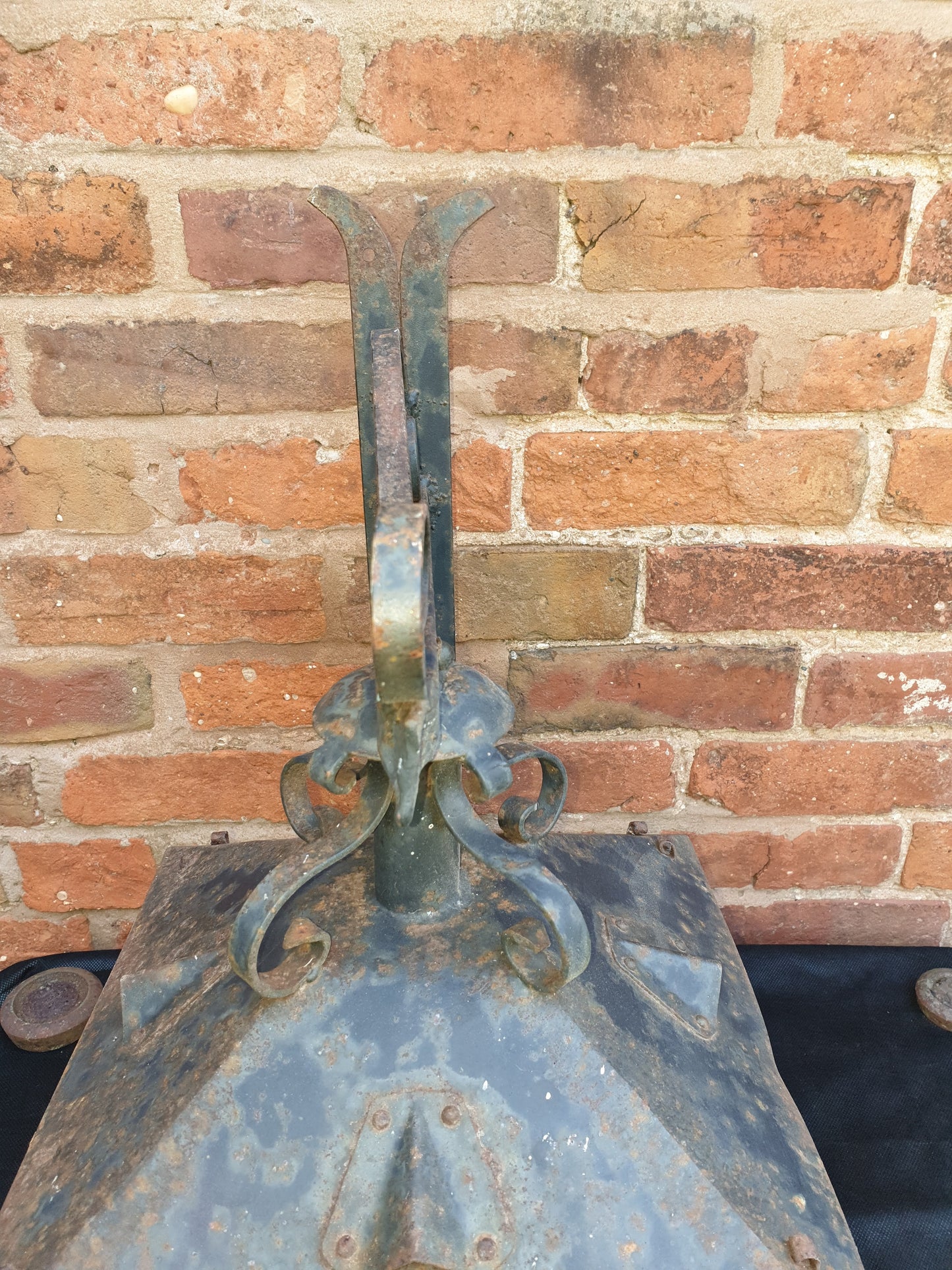Antique wrought iron coach lamp
