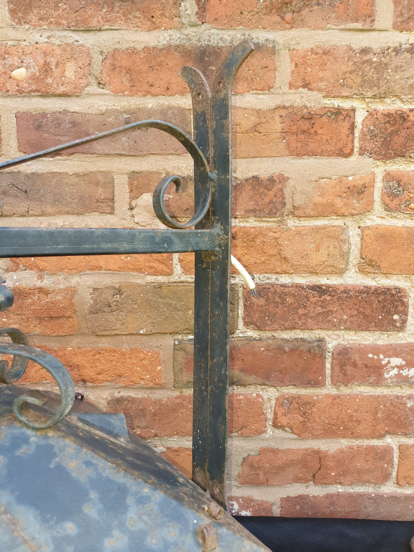 Antique wrought iron coach lamp