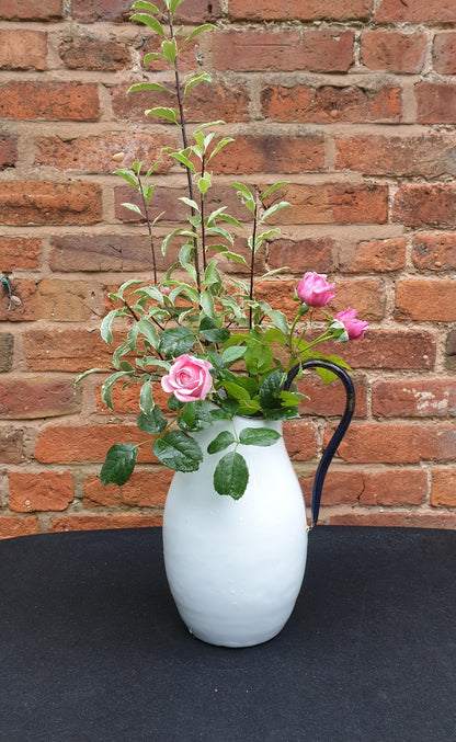 Enamel jug, large rounded.