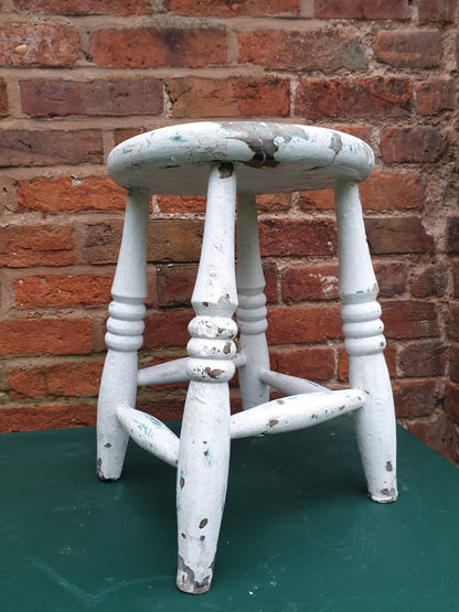 Small round white wooden stool