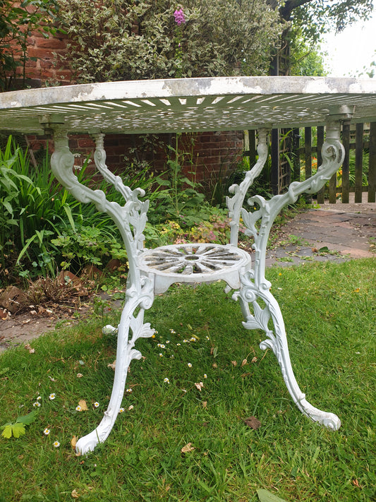 Round cast iron garden table